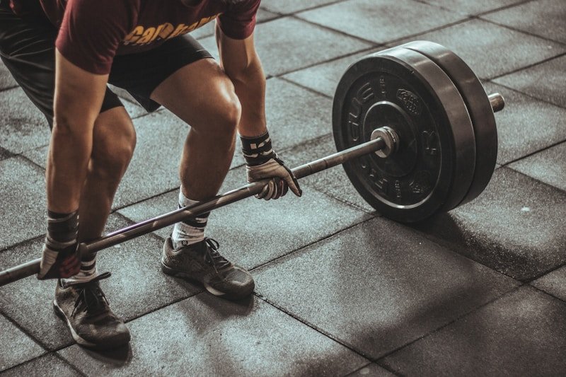 Structured weight lifting programs apply the FITT principle to ensure safe and effective progression. Source: Unsplash.
